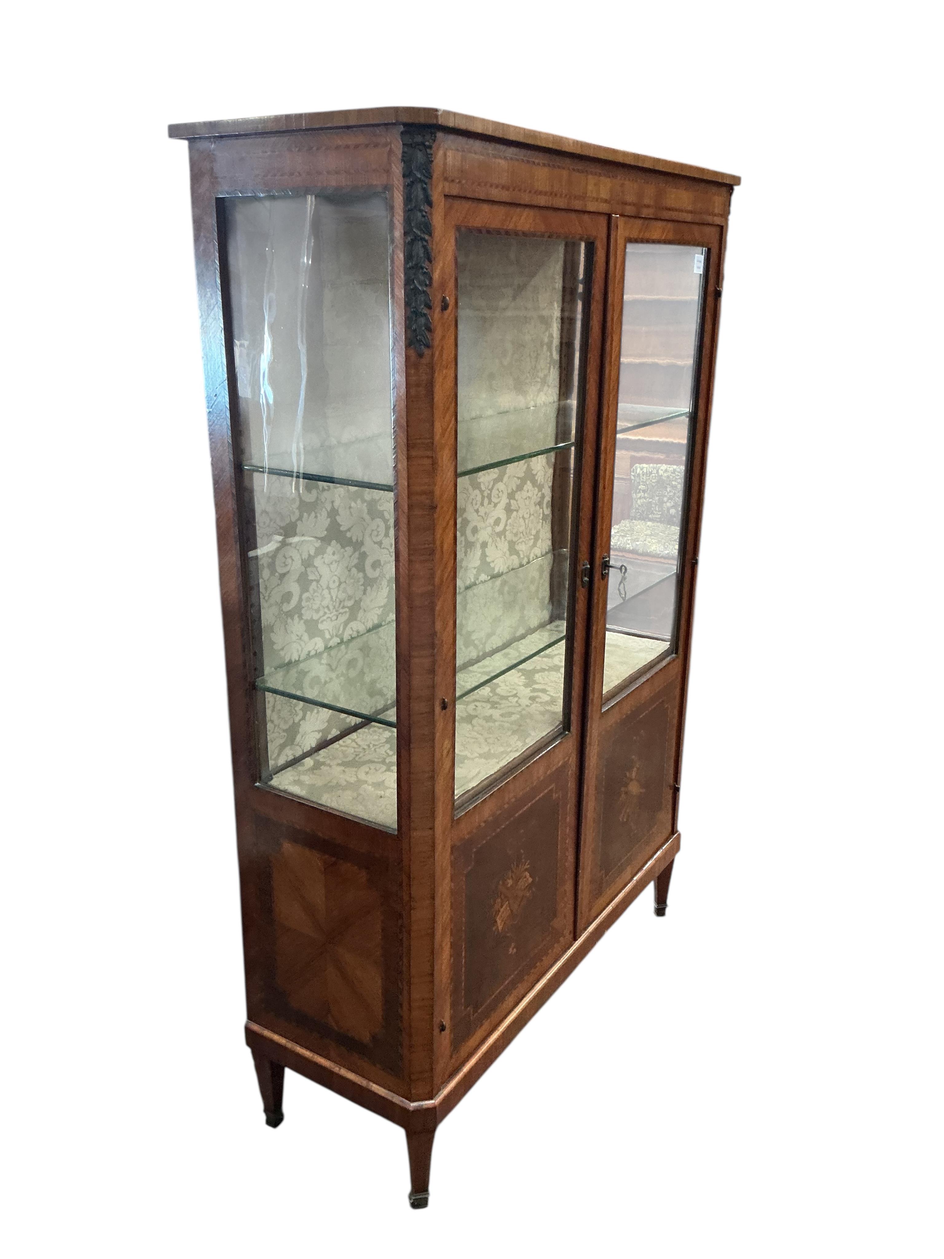 A 19th century French marquetry inlaid kingwood vitrine, width 108cm, depth 41cm, height 163cm